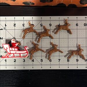 Vintage Santa and Reindeer Plastic Figurine Set